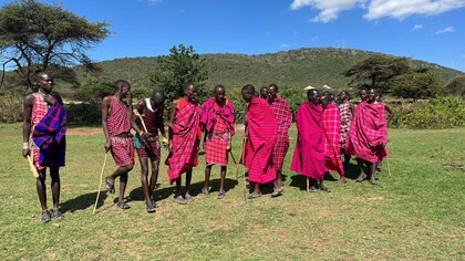 A still-shot of Kristen Fiani's welcome dance to the Maasai Village in East Africa