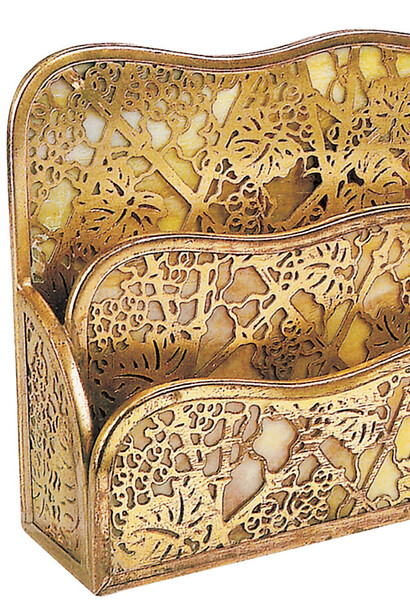 Louis Comfort Tiffany, 1848-1933, American.
Document holder with three dividers, c, 1900,
Gilded bronze with lattice work and foliage and honey-colored, marbled glass, height: 25 cm,
Private collection, Art Nouveau
