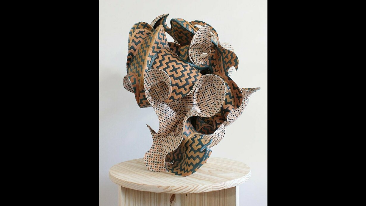 Austin Ballard, Perforator 5 (Maple Gathering in Square Repeat), 2024,
Cane webbing, epoxy clay, and textile dye, 28 x 23 x 26 inches. Courtesy of the artist and McKenzie Fine Art