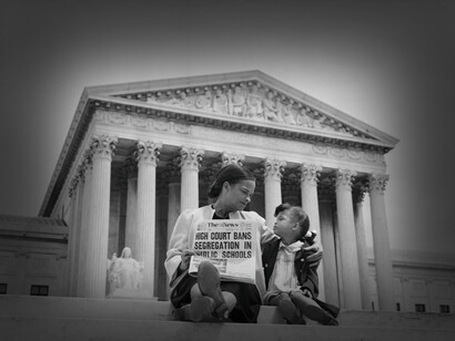Nettie Hunt and her daughter Nickie on the steps of the U.S. Supreme Court in 1954 as she explains the meaning of the high court's ruling case that segregation in public schools is unconstitutional. Bettmann Archive, USA