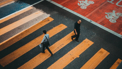 Two men strolling down the street
