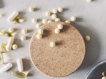 Assorted medications laid out on individual plates atop a table - Demonstrating diverse pharmaceutical treatments available for addressing obsessive-compulsive disorder (OCD)