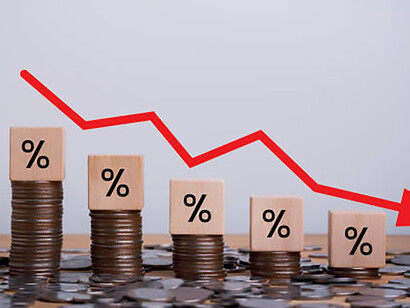 Representation of brand failure: Wooden cubes with percentage sign, stack of coin bar chart, and downward trending red graph on white background