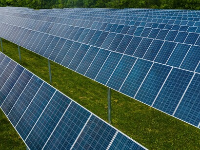 In Rossville, GA, United States a vibrant solar farm displays rows of photovoltaic panels, highlighting the use of renewable energy