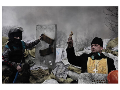 Second Prize Spot News Category, Stories. Jérôme Sessini, France, Magnum Photos for De Standaard. 19-21 February, Kiev, Ukraine. Caption: A protester calls for medical aid for a comrade shot dead
