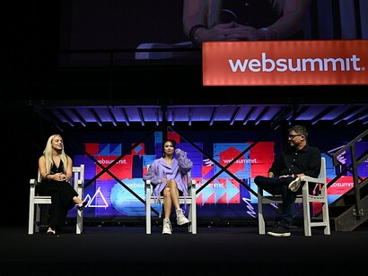 Speakers, from left: Ana Markovic, professional footballer and co-founder of Grasshopper Club/Reloadz; Christine Peng-Peng Lee, former Olympian and content creator; and Gustavo Poli, director of sports shows and digital content at Globo, on the SportsTrade Stage during day one of Web Summit