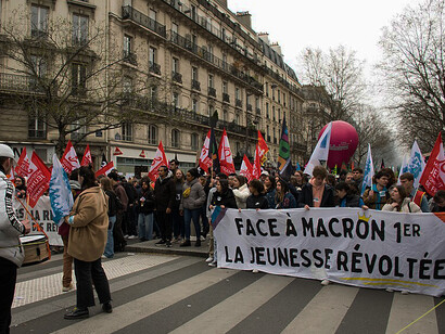 Demonstrators gathered around and occupied the July Column during the Paris march of March 28, 2023, protesting the pension reform