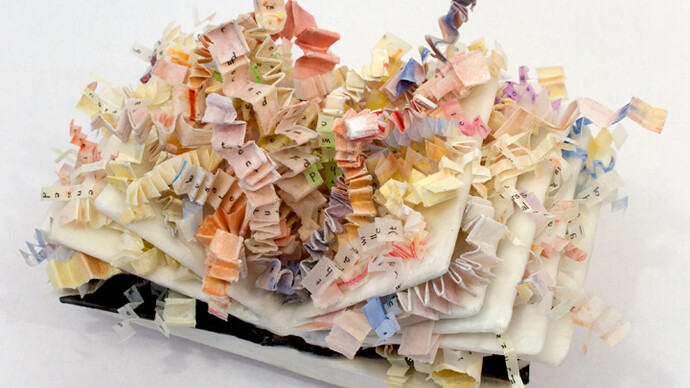 Deborah Winiarski, Lines Written II, 2012, encaustic, kozo paper, plaster, wood, book cover, 6” x 11” x 7”