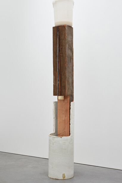Oscar Tuazon for Ariana Reines, Pa, 2016 Concrete, wood, bucket, water, soap, paper, poems 280 x 41 x 41 cm, 110 1/4 x 16 1/8 x 16 1/8 ins. Courtesy Stuart Shave/Modern Art, London
