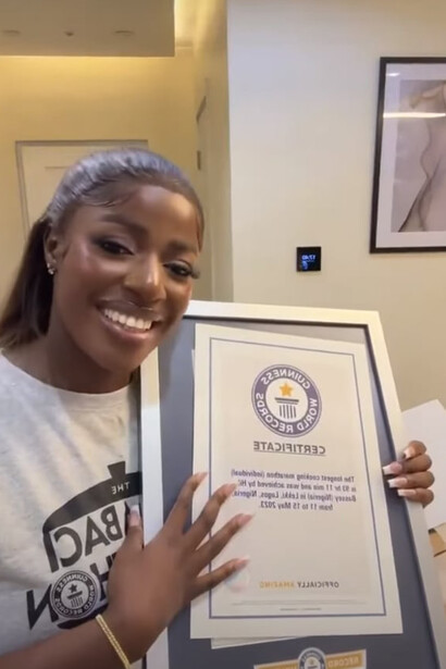 In a moment of triumph, Chef Hilda Baci is officially bestowed with the prestigious certification from Guinness World Records