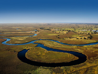 The landscape of Okavango Delta, Namibia, which is one of Africa's last great natural sanctuaries, a pristine and rich wilderness home to vast concentrations of wildlife
