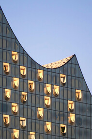Standing on the Grasbrook peninsula of the Elbe River in Hamburg’s HafenCity, northern Germany, the Elbphilharmonie (Elphi) symbolizes the city’s maritime spirit, with a design inspired by waves and sails, resting gracefully atop a century-old brick warehouse close to the Speicherstadt