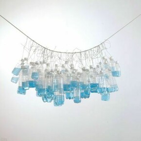 It Seemed a Beautiful Day, 2002, Plastic bottles with plastic caps, water, food dye, wire, rope, Bottles: 23 x 48 x 23 inches (58.4 x 121.9 x 58.4 cm); overall dimensions variable, Collection of the San Francisco Museum of Modern Art. Purchased through the In/Site Fund and the James Wilson Trust in memory of Michael Moran. Photograph by Adam Reich