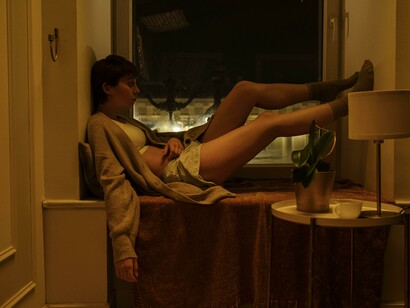 A young woman, desperate, she can't get any sleep