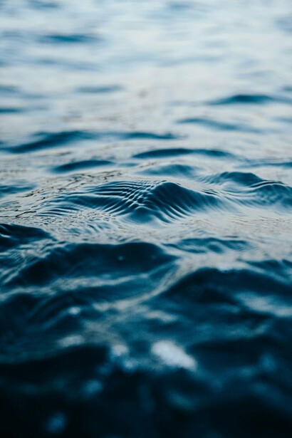 Serene, calm water; liquid silk that adapts to its environment