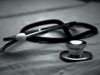 A stethoscope on a desk