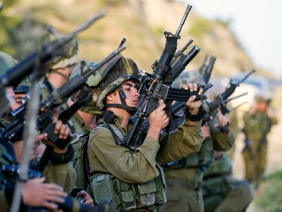 Soldier preparing his gun