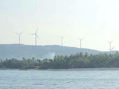 Caparispisan Wind farm in Saud Beach, Pagudpud, Philippines 
