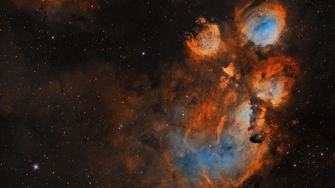 NGC 6334, conocida como Nebulosa Pata de Gato