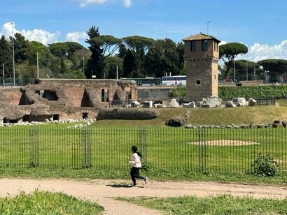 Sara Terracina jogging with maximum effort at Circus Maximus in Rome