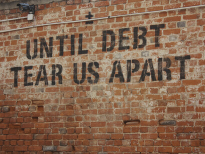 Writing on the wall: the cycle of debt is making it hard to establish equality around the globe