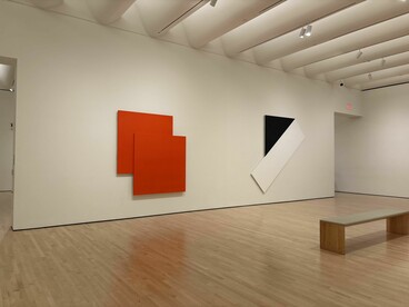 Installation view at the San Francisco Museum of Modern Art (SFMOMA) featuring Ellsworth Kelly’s Red on Red (2001, oil on canvas) and Black Triangle with White (1976, oil on canvas), both from the Doris and Donald Fisher Collection. Photo: © İdil Burkutoğlu