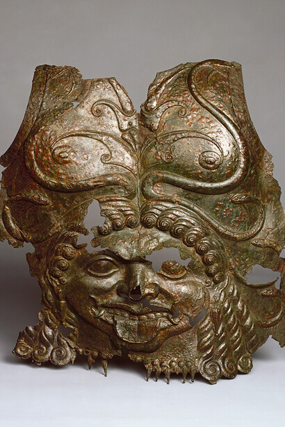 Excavated by N.I. Veselovsky, Breastplate with a relief depiction of the head of the Gorgon Medusa, late 6th – 5th century BC. Courtesy of State Hermitage Museum