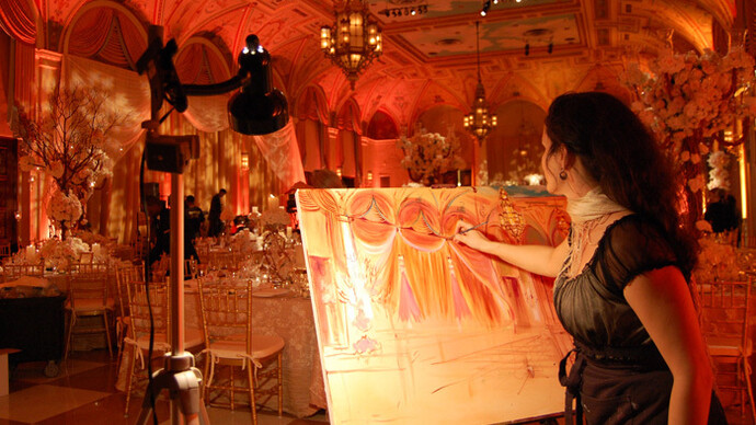 Instead of just photos, some will decide for a painting of a scene of the wedding by an artist who live paints