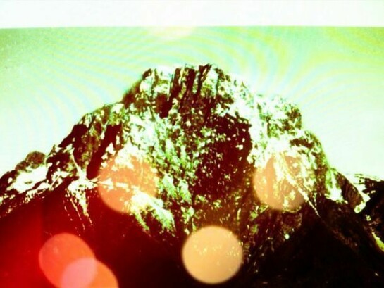 Detail from Mountains, Moving: Slide Show, 2013, m4v file on a flash-drive, Edition of 50