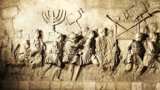 A relief on the Arch of Titus depicts Roman soldiers carrying treasures looted from the Jerusalem Temple, including the sacred menorah, during a triumphal procession following the conquest of Jerusalem in 70 CE