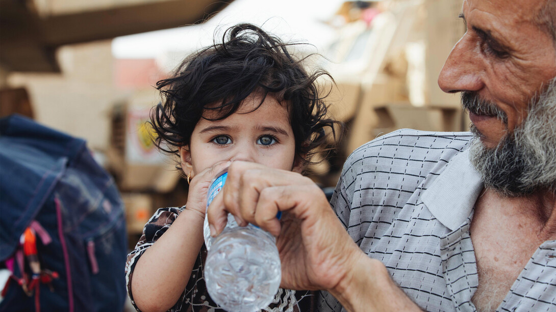 Distribuzione dell'acqua alle famiglia dopo attacco Isis in Iraq, 2020 (Sir Barnaby)