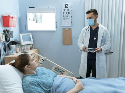 A doctor informing a patient of their sickle cell disease