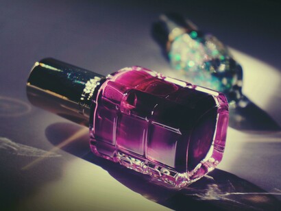 Close-up of nail polish highlights the lipstick effect, showcasing small luxuries people turn to for confidence and comfort in tough times