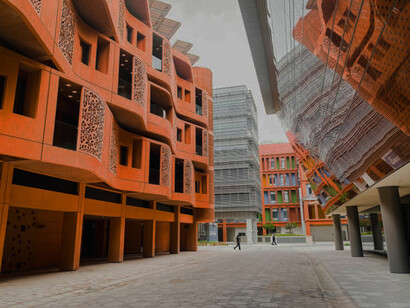 Visitors to Masdar City in Abu Dhabi can experience a futuristic, car-free environment powered largely by solar energy