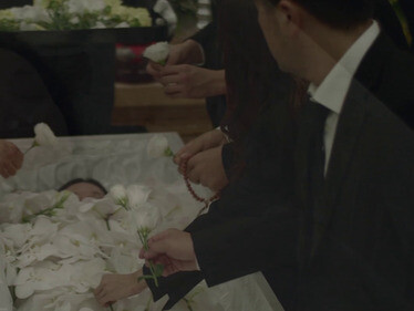 Performing Kaoru's funeral, a darkly comic family drama