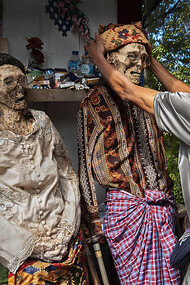 The Ma'nene Ritual is a traditional ceremony in Tana Toraja where the bodies of ancestral family members are exhumed, carefully cleaned, and dressed in new clothes as a way to honor and show respect for the deceased