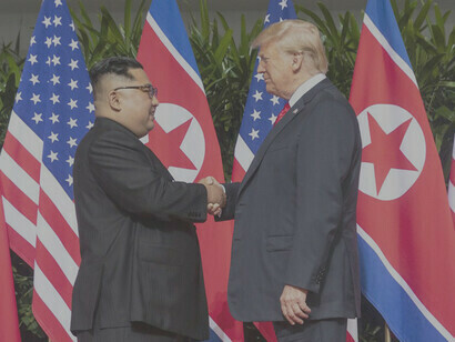 President Trump and the General Secretary of the Workers' Party of Korea, Kim Jong Un, shake hands during a summit meeting in Singapore on June 12, 2018