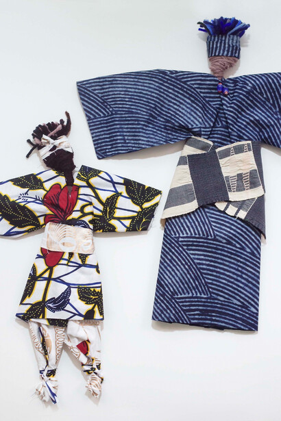 Coat rack puppets created by Vickie Frémont, the African Ninja and the Japanese Samurai