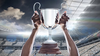 A triumphant hand grasping the UEFA Euro 2024 championship cup in victory, symbolizing the essence of champions