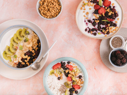 This vibrant combination of yogurt, kiwi, and strawberries illustrates the powerful impact of a balanced diet on mental well-being and emotional stability