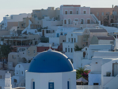 The sun rises over one of the Mediterranean tourism hotspots, Santorini, Greece