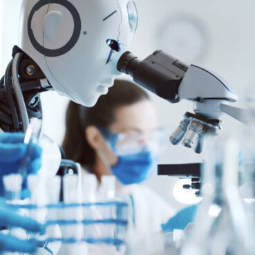 Woman working with an android robot in a science laboratory