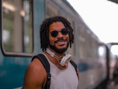 Venturing into new landscapes, this traveler embodies resilience and self-reliance, embracing the journey as a testament to personal strength