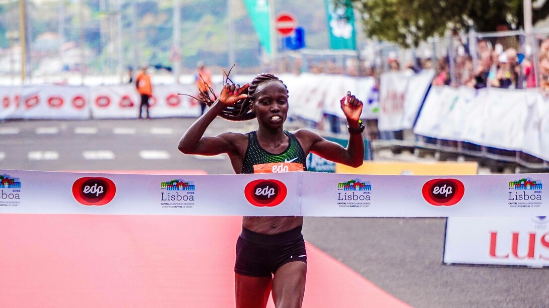 Woman running to win a race