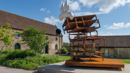 Phyllida Barlow, untitled: stackedchairs (detail), 2014, timber, plywood, cement, paint, sand, PVA, varnish, 150 x 640 x 455 cm / 59 x 252 x 179 1/8 inches, © Phyllida Barlow Estate. Courtesy of the Phyllida Barlow Estate and Hauser & Wirth. Photo: Alex Delfanne
