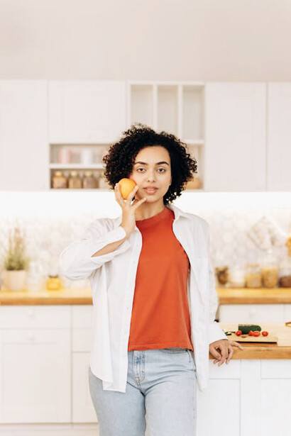 Embrace the power of a balanced diet rich in fibre and nutrients like such as a fresh orange, essential for maintaining a healthy gut microbiome