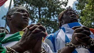 Two Africans enslaved by colonialists
