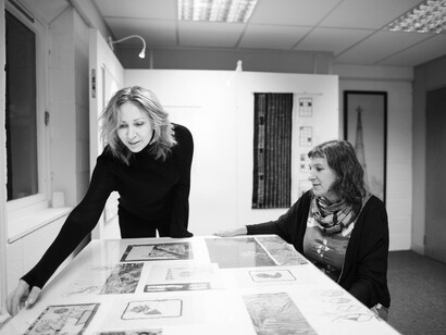 Marina Shtager and artist Maria Arendt working on the Bauhaus exhibition, 2019