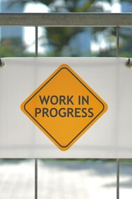 A sign to remind us that humanity's progress is still a work in progress