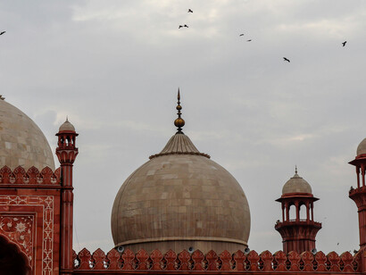 The Badshahi Mosque (Punjabi: شاہی مسجد, Urdu: بادشاہی مسجد) is a grand Mughal imperial mosque in Lahore, Punjab, Pakistan. Commissioned by Emperor Aurangzeb and constructed from 1671 to 1673, it faces the Lahore Fort and marks the northern boundary of the historic Walled City